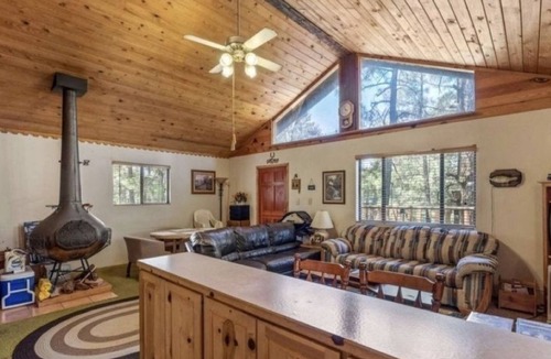 Show Low Cabin | A centrally located secluded mountainside log cabin w/panoramic valley views.