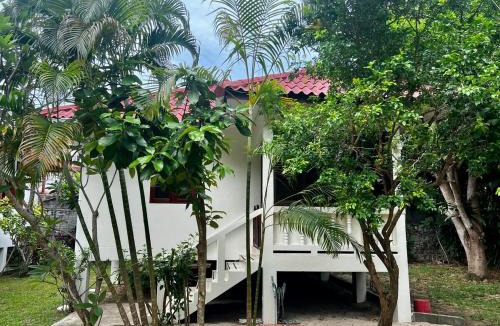 Hua Thanon House | Beachfront Bungalow - Steps Away from the Sea