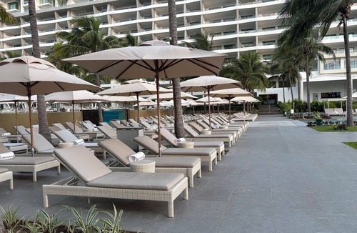 Puerto Juarez Apartment | Bright Junior Suite perfect for romance and relaxation.