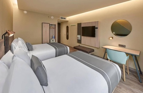 Cancun Hotel | Convenient Stay with Kitchenette, Rooftop Terrace, Outdoor Pool & Breakfast
