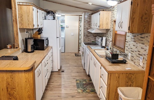 Desert Sands Golf Country House | Cozy golf course quarters with amazing freeway access