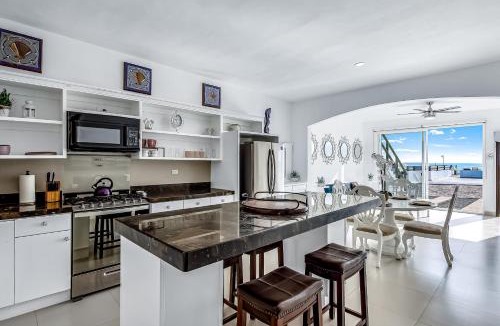 La Paloma House | Dog-Friendly Oceanfront Villa with Rooftop Patio, Pool Access, & Kitchen