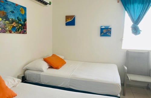 Punta Sam Apartment | Standard Quadruple Room