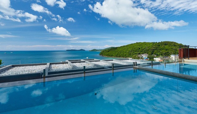 Panoramic Two Bedroom Pool Villa with sweeping ocean view.