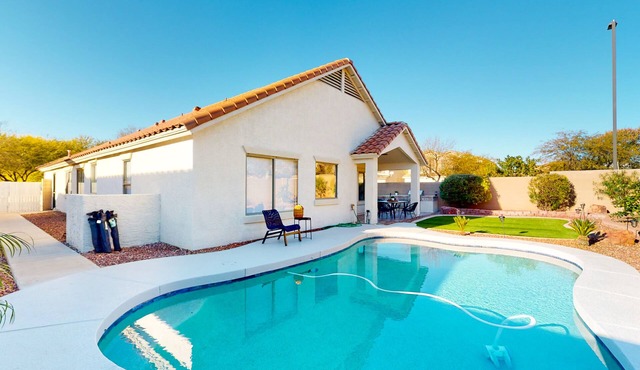 Power Ranch home with private pool, outdoor areas & a park across the street
